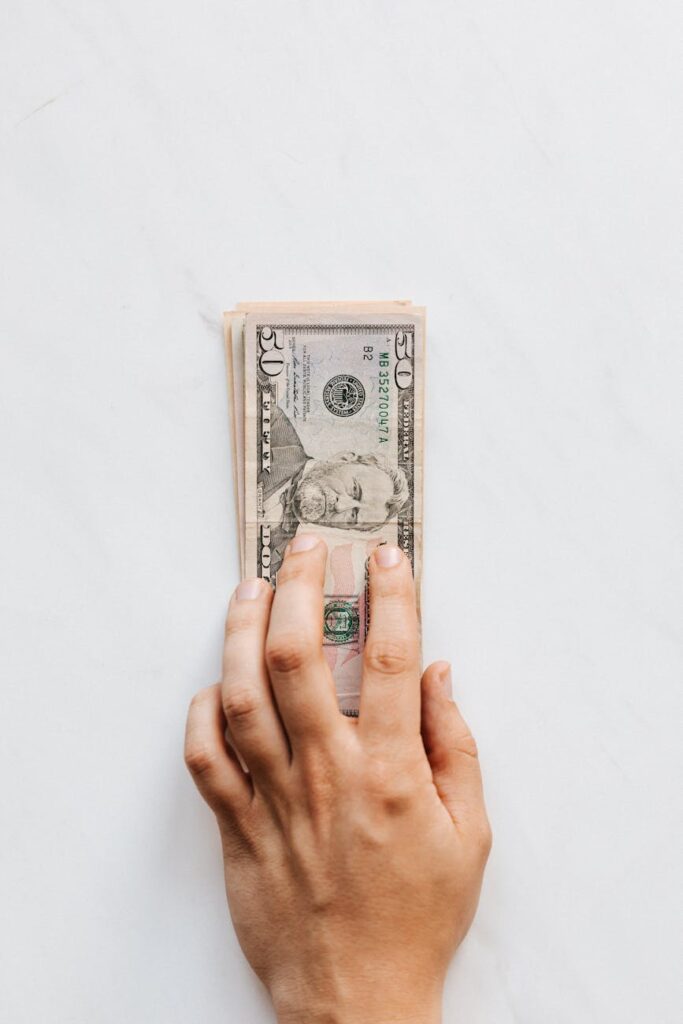 A father smiling proudly after using an SRD grant to rebuild his life.